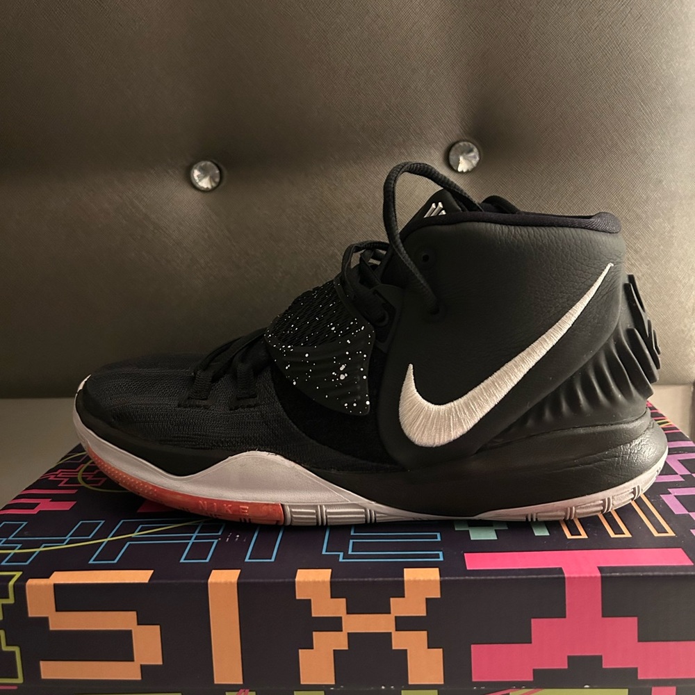 Size 7y kyrie Irving’s basketball shoe.